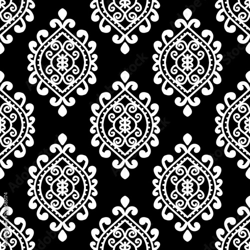 Elegant black and white seamless damask pattern. Classic victorian style motif for textile print, wallpaper background, and luxury fabric design. Symmetrical monochrome geometric ornament.