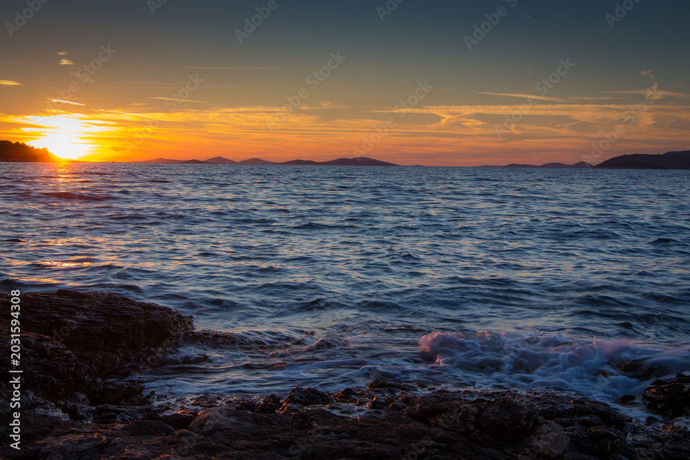 Fototapeta premium Panorama of the sea sunset, beautiful sunset at the Adriatic sea, dalmatia, Croatia