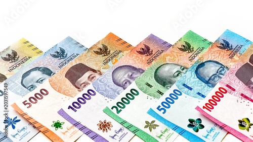 Obraz na płótnie A detailed view of Indonesian rupiah banknotes in various denominations and colors
