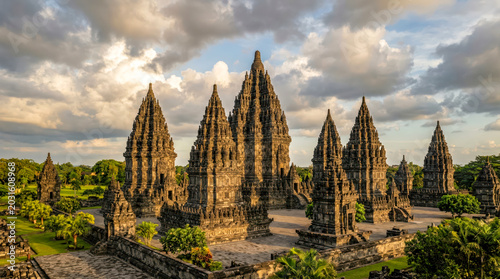 Majestic tall stone spires of ancient Prambanan Hindu temple at golden hour
