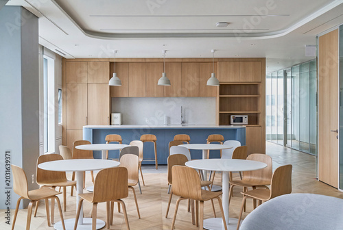 Modern restaurant and lounge interior with refined seating and warm architectural lighting