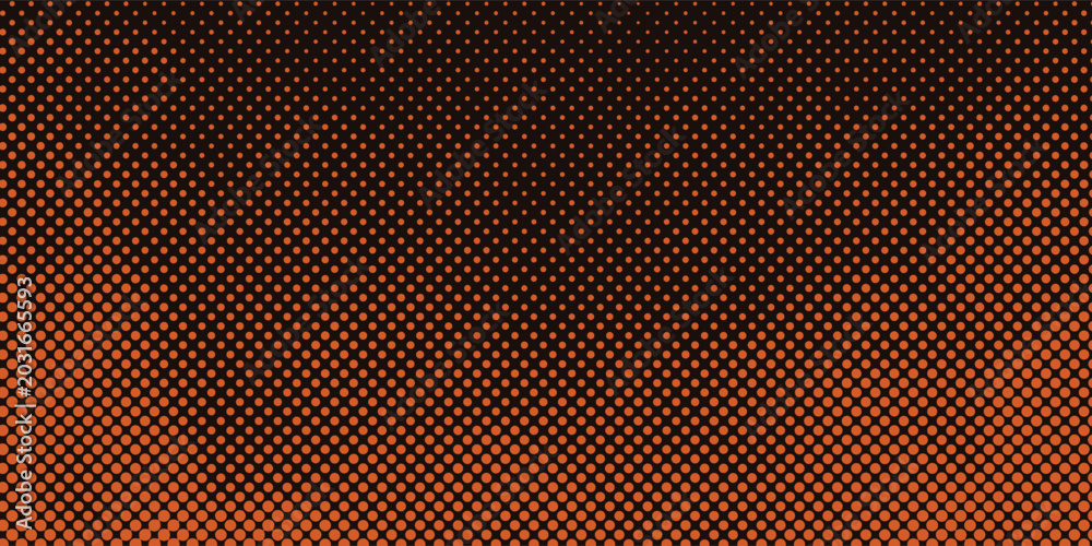 Fototapeta premium Close-up of orange hexagonal perforated metal with gradient lighting.