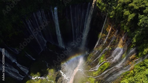 Stunning 4K aerial view of Tumpak Sewu waterfall curtains in East Java, Indonesia.