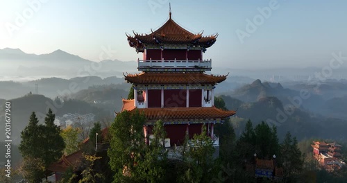 Sunrise and ancient chinese buddha temple landscape in Hunan province,China