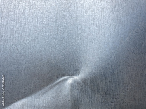 Bilde på lerret Texture of a dented metal sheet for metal texture or abstract metallic background