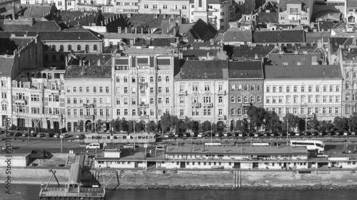 Budapest city buildings line Danube riverfront street