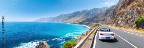White Convertible Driving Along Scenic Coastal Highway