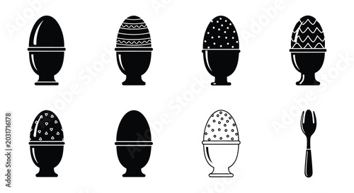 Foto Egg in egg cup silhouettes with fork black and white vector