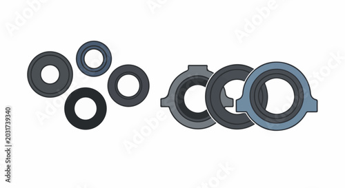 Assorted circular components with holes, varying sizes and shades of gray