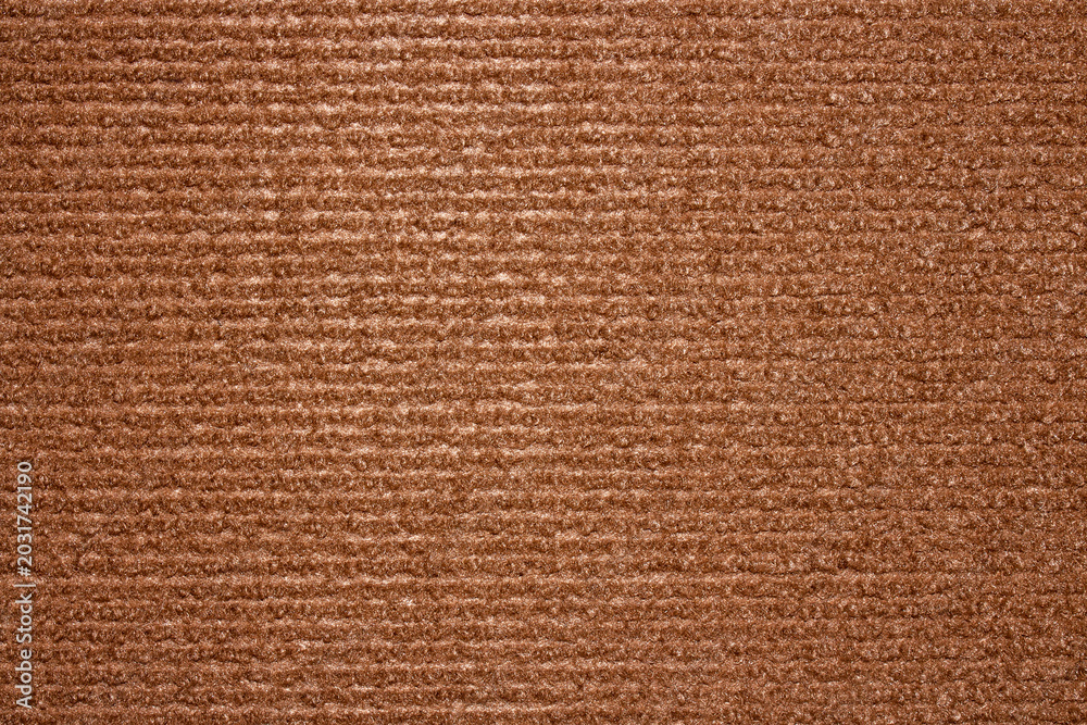 Fototapeta premium The texture is brown carpet.Self-adhesive scratching post for cats.Durable carpet for cats.