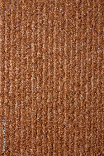 The texture is brown carpet.Self-adhesive scratching post for cats.Durable carpet for cats.