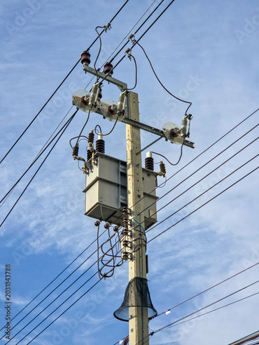 Fotografi Vertical View of Electrical Transformer on Utility Pole with Power Lines