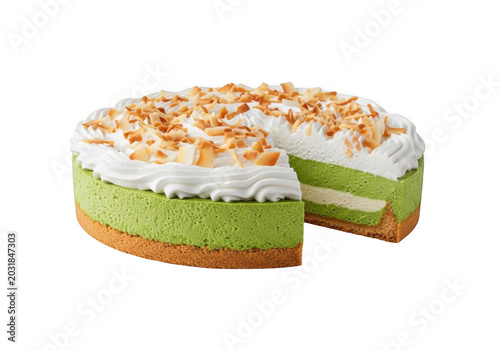 Matcha green tea mousse cake with whipped cream frosting and toasted coconut flakes on a golden brown crust, isolated on black background