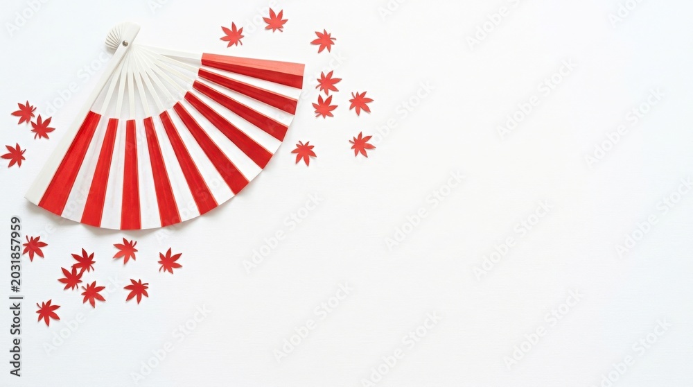 Obraz premium Folding fan with red and white stripes and scattered maple leaves, Canada Day celebration, minimalist festive background for seasonal holiday greeting cards