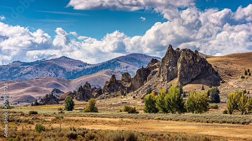 Dramatic Idaho Landscape - Rock Formations, Mountains, and Expansive Sky.