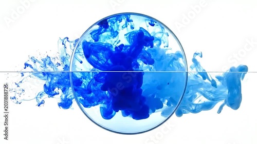 Blue ink swirls inside a glass sphere against a white background