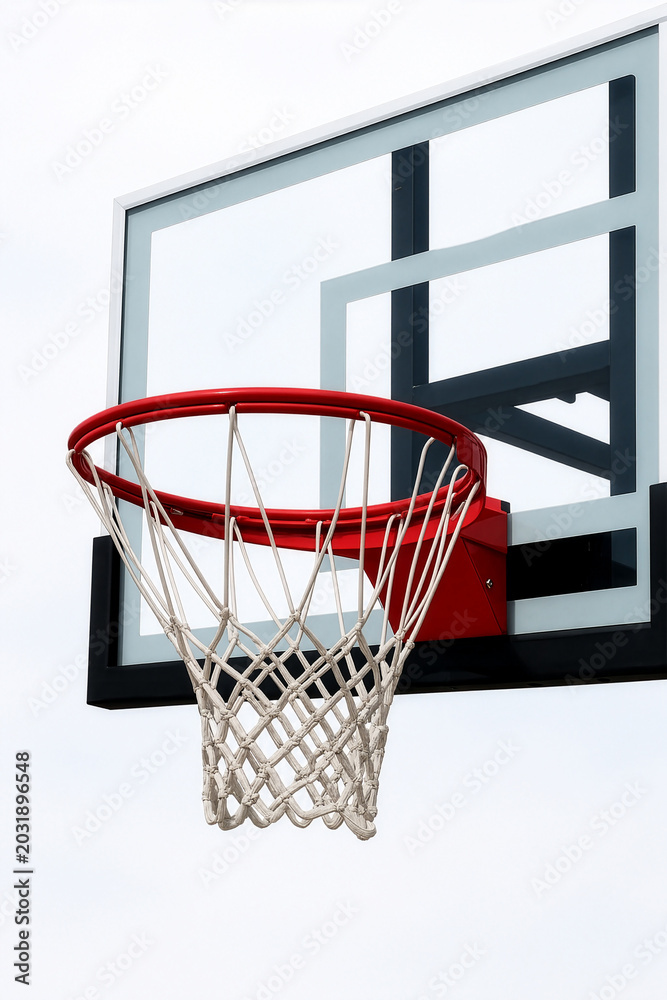 Naklejka premium Basketball hoop, net, and backboard up close with white background