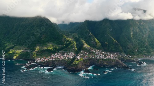 Aerial view of Seixal village on Madeira island, Portugal, with Atlantic Ocean and mountain landscape