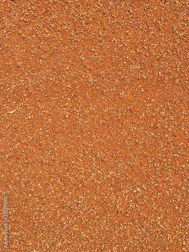 Photos Red baseball infield dirt texture background filled with crushed clay