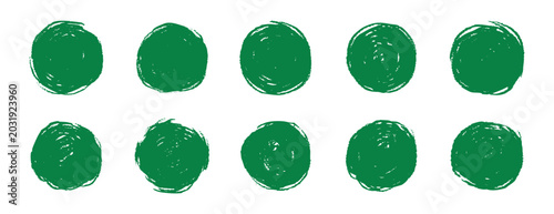 Photos Green hand drawn pencil circles arranged on white background, rough textured rin