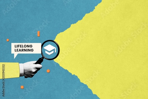 Foto Hand with magnifying glass, Lifelong Learning text on colorful background