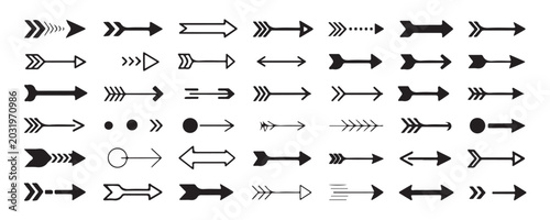 Vintage style arrow collection with feather tail details and tribal motifs for rustic and classic decorations.