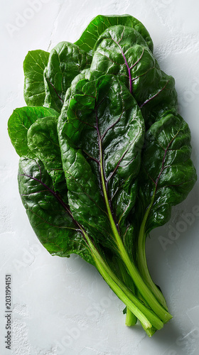 Fresh organic Swiss chard bunch isolated on a clean white background showcasing vibrant green leaves and colorful stems.  made with generative AI