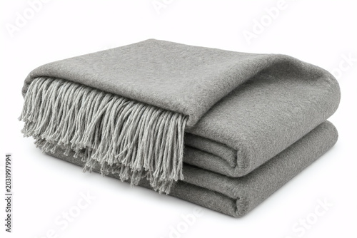 folded grey cashmere throw blanket with fringed edges