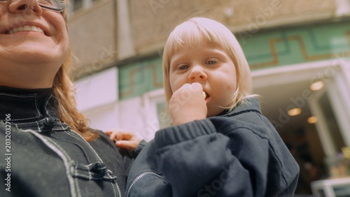 фотографія Heartwarming image of caregiver and youngster outdoors smiling