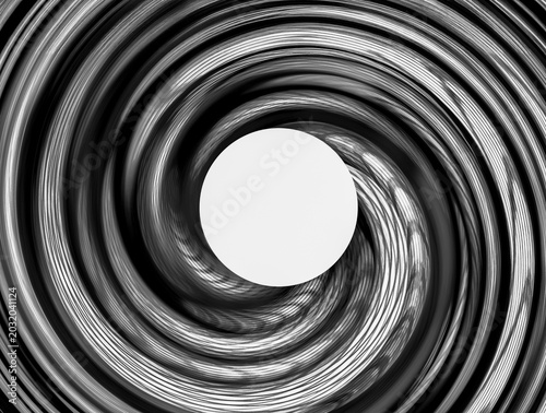 A spiral abstract design in black and white monochrome with copy space