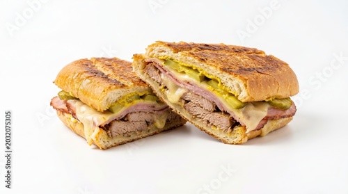 Classic Cuban sandwich on a white backdrop.