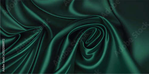 Fotografie Elegant Dark Green Fabric Drape - Close-up view of smooth, lustrous dark green fabric arranged in elegant, flowing folds