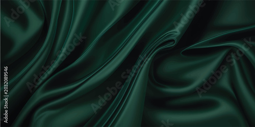 Fotografija A close up of flowing green fabric with soft folds and shadows creating a smooth