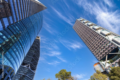 A dramatic low angle perspective of modern corporate business skyscrapers and financial district office buildings on Reforma Avenue in Mexico City Mexico