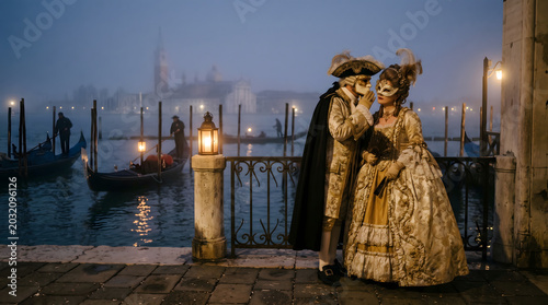 Masquerade couple sharing secret during venice carnival