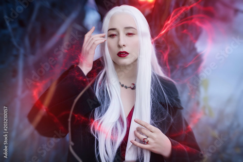 Gothic female vampire with magical energy character in the dark fantasy genre.