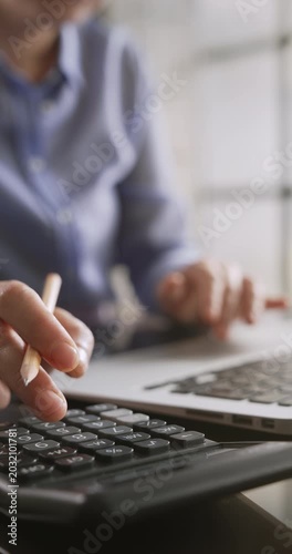 Calculation using a calculator and data entry into a computer