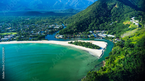 Tableau sur toile Aerial view of a tropical white sand beach meeting a green river estuary / Vista