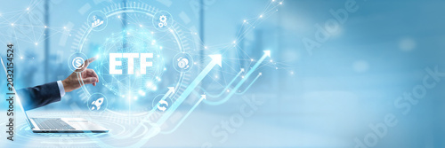Photos Businessman touching virtual interface with ETF and exchange traded fund investment networking