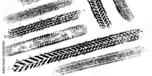 Photos Black tire track marks and vehicle tread patterns set on a simple surface