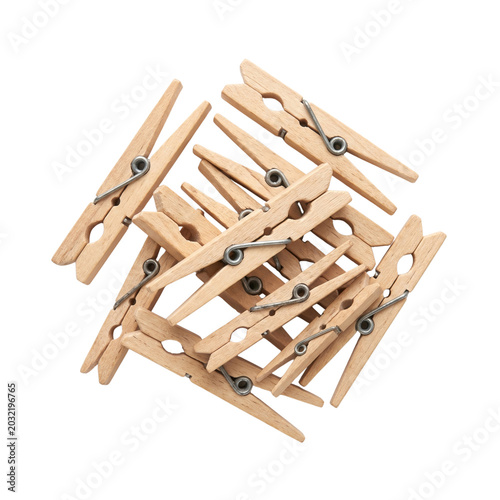 Wooden clothespins scattered