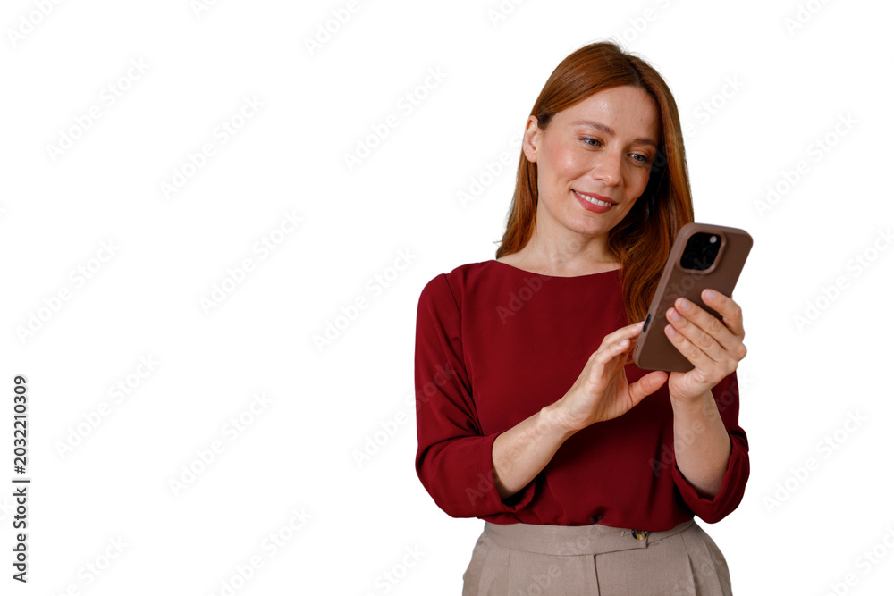 Fototapeta premium Woman smiling while using phone, social media communication, staying connected online with modern technology