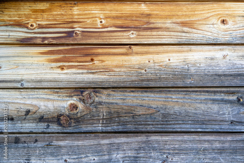 Weathered wooden planks with a rustic natural texture, ideal for background, backdrop, or design use.