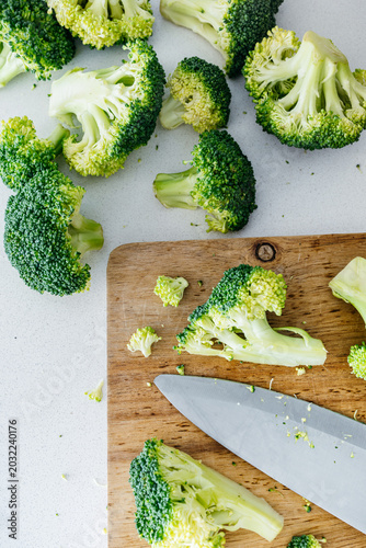 Top View of Cutting Broccoli on a Wooden Board