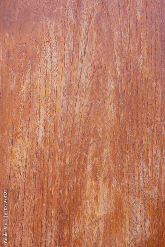 Reddish-brown wooden board with natural grain