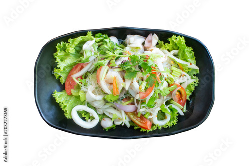 Spicy Thai glass noodle salad with seafood, featuring shrimp and squid.