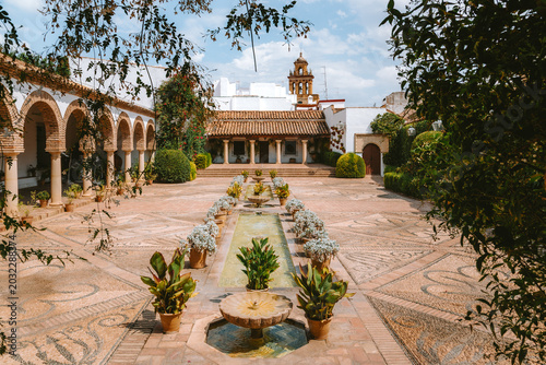 Photos Intricate pebble mosaics adorn a classic Spanish courtyard, featuring an elegant
