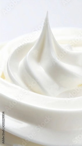 Macro closeup of white whipped cream swirl, smooth dairy texture for dessert toppings, culinary food photography, sweet ingredient for cake