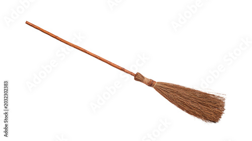 Classic household cleaning instrument, featuring a rustic straw bristle head and a sturdy wooden pole, perfect for sweeping floors and evoking traditional charm 