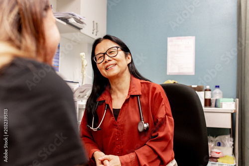 healthcare professional consulting with a patient in a clinic